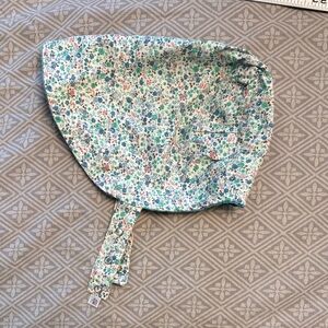 Urban baby bonnet reversible sun bonnet in blue floral. 0-6 mos